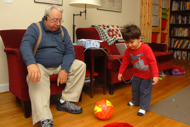 showing grandpa the soccer ball