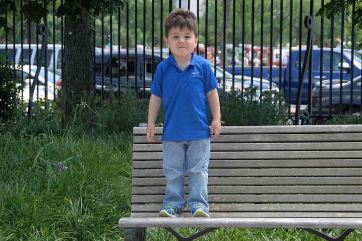 Peter standing on a bench
