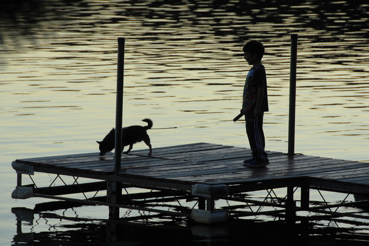 with dog on dock