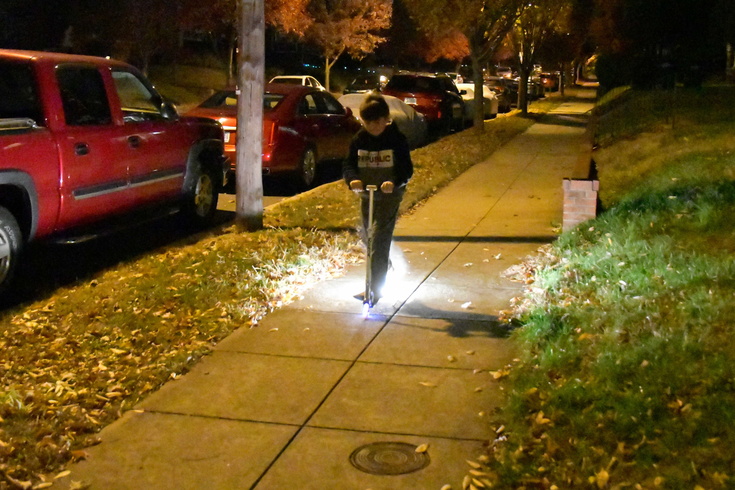 lighting up the sidewalk