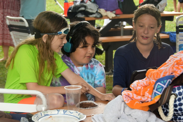 showing the ipad to friends